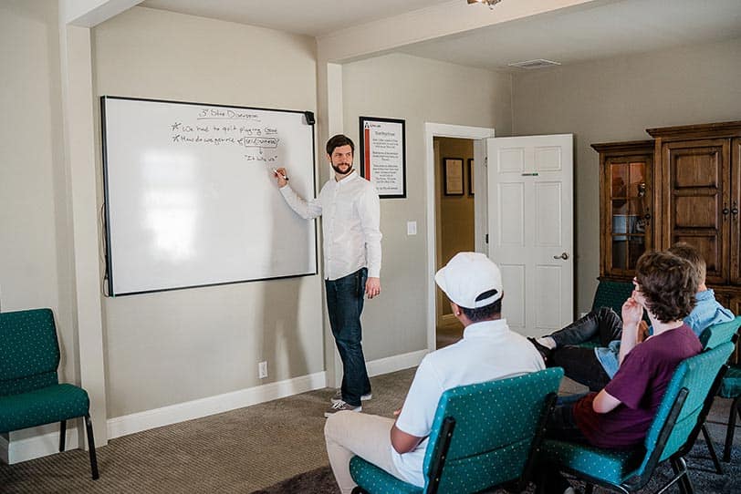 An image of a life skills specialist leading a success management coaching session