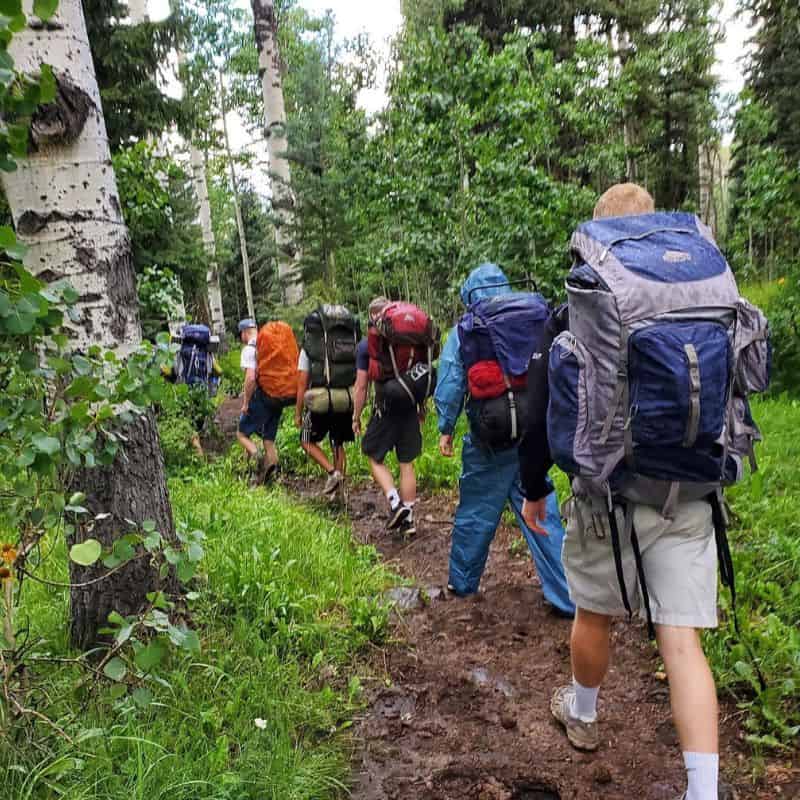 Young adult men on a hike for Austin outpatient addiction treatment